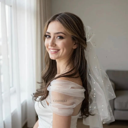Voile de mariée perles avec nœud 'Miss'